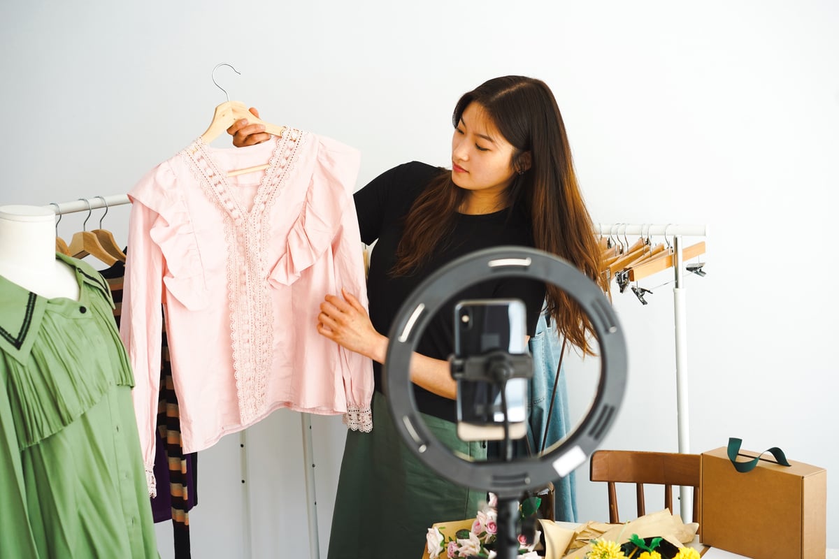 Woman Live Selling Preloved Clothes Online